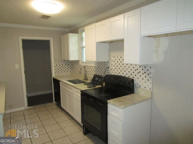 3 bedroom, 1 bathroom, 936 sq ft single family residence for sale at 1035 Putnam Street, Macon, GA 31206 — photo 5