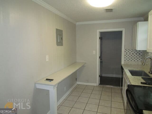 3 bedroom, 1 bathroom, 936 sq ft single family residence for sale at 1035 Putnam Street, Macon, GA 31206 — photo 4