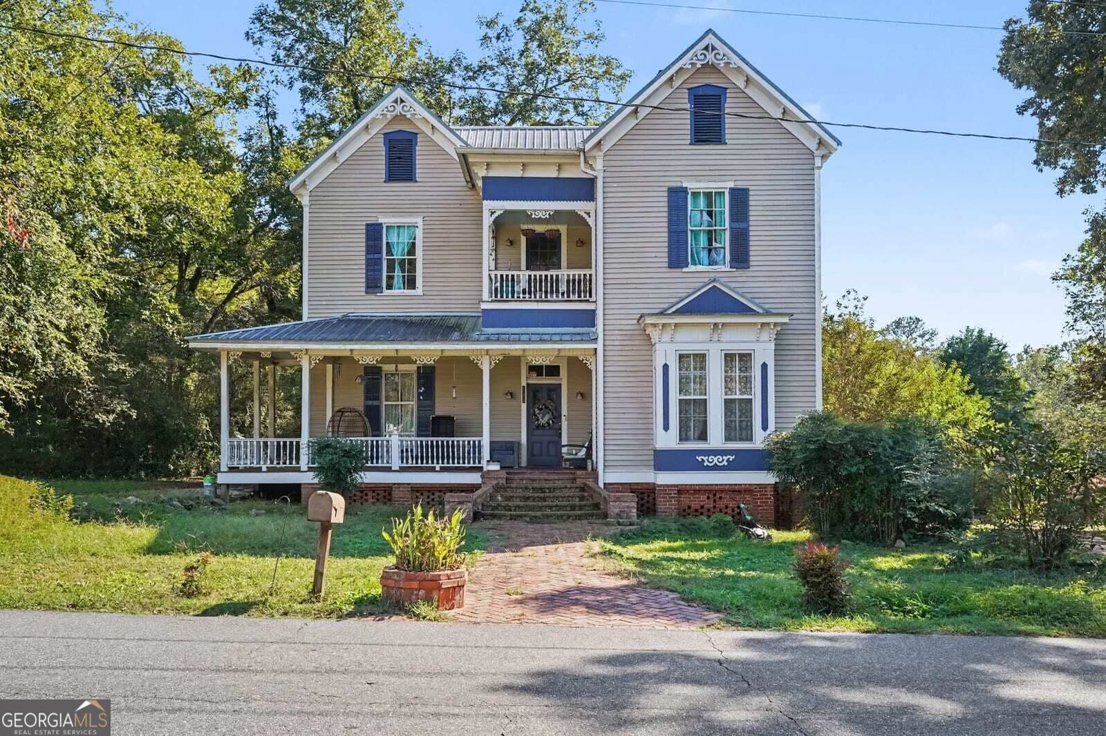 5 bedroom, 5.5 bathroom, 3,540 sq ft single family residence for sale at 142 Beaty Street, Flovilla, GA 30216 — photo 1 of 20
