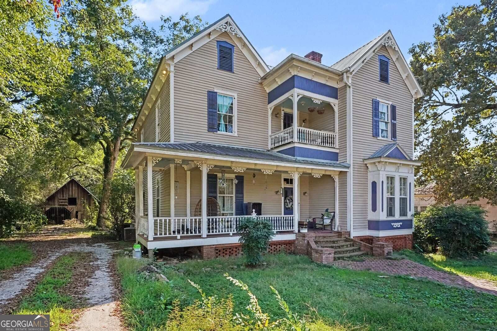 5 bedroom, 5.5 bathroom, 3,540 sq ft single family residence for sale at 142 Beaty Street, Flovilla, GA 30216 — photo 5