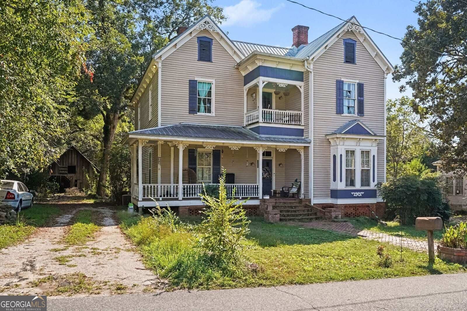 5 bedroom, 5.5 bathroom, 3,540 sq ft single family residence for sale at 142 Beaty Street, Flovilla, GA 30216 — photo 4