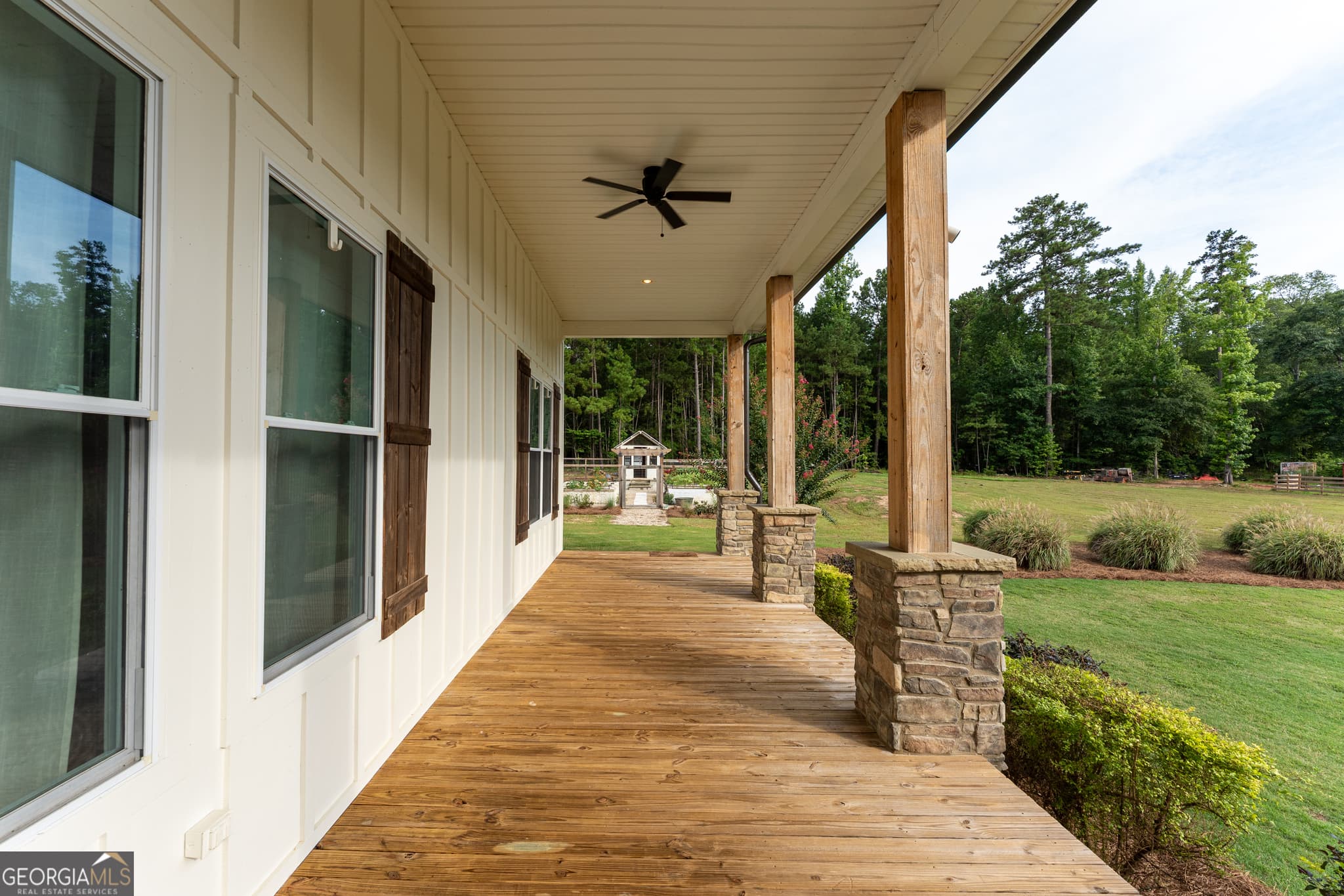 5 bedroom, 4.5 bathroom, 4,480 sq ft single family residence for sale at 325 Scuffleboro Road, Eatonton, GA 31024 — photo 6