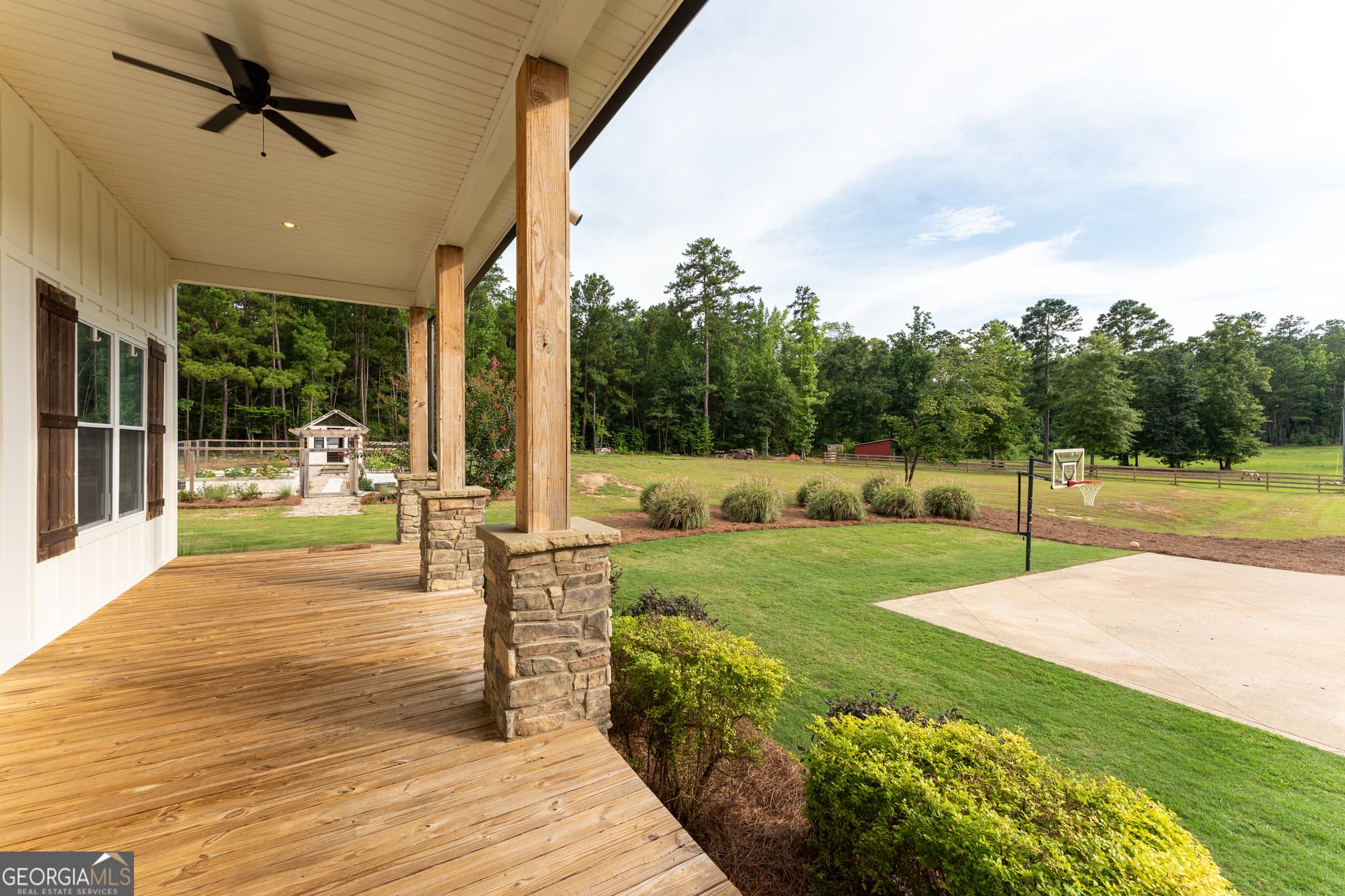 5 bedroom, 4.5 bathroom, 4,480 sq ft single family residence for sale at 325 Scuffleboro Road, Eatonton, GA 31024 — photo 7