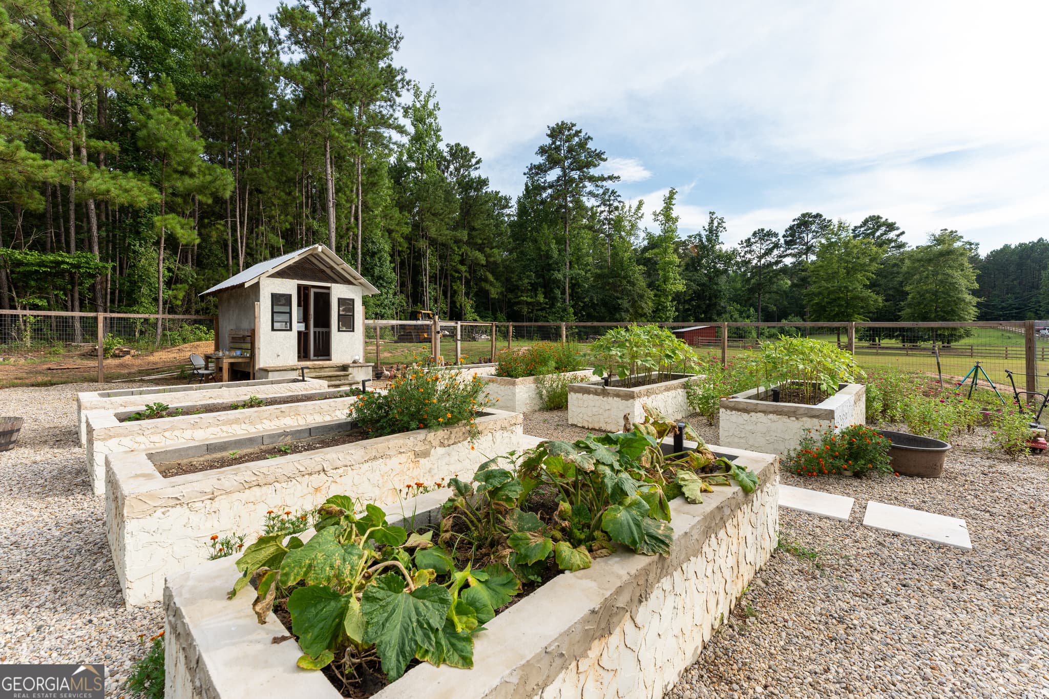 5 bedroom, 4.5 bathroom, 4,480 sq ft single family residence for sale at 325 Scuffleboro Road, Eatonton, GA 31024 — photo 9