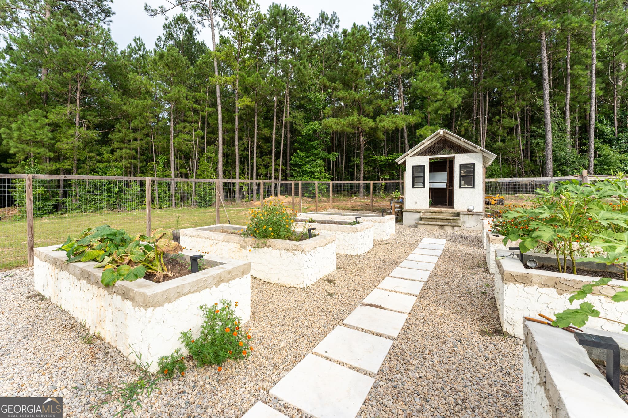 5 bedroom, 4.5 bathroom, 4,480 sq ft single family residence for sale at 325 Scuffleboro Road, Eatonton, GA 31024 — photo 8