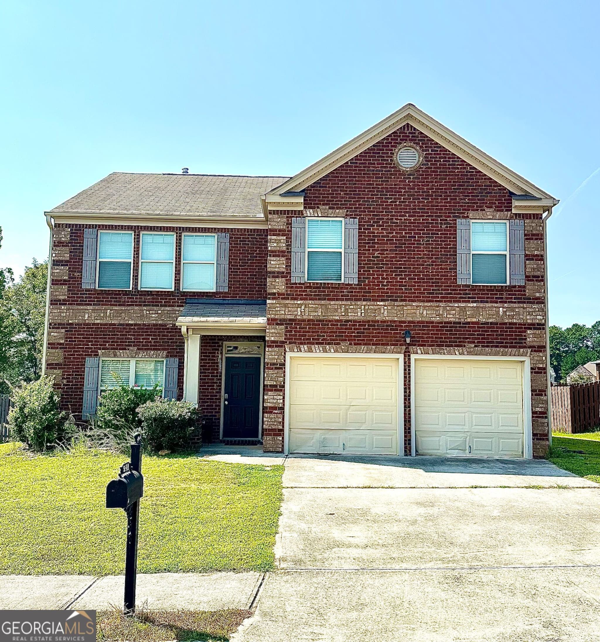 5 bedroom, 3 bathroom, 2,556 sq ft single family residence for sale at 5811 Rex Ridge Parkway, Rex, GA 30273 — photo 1 of 28