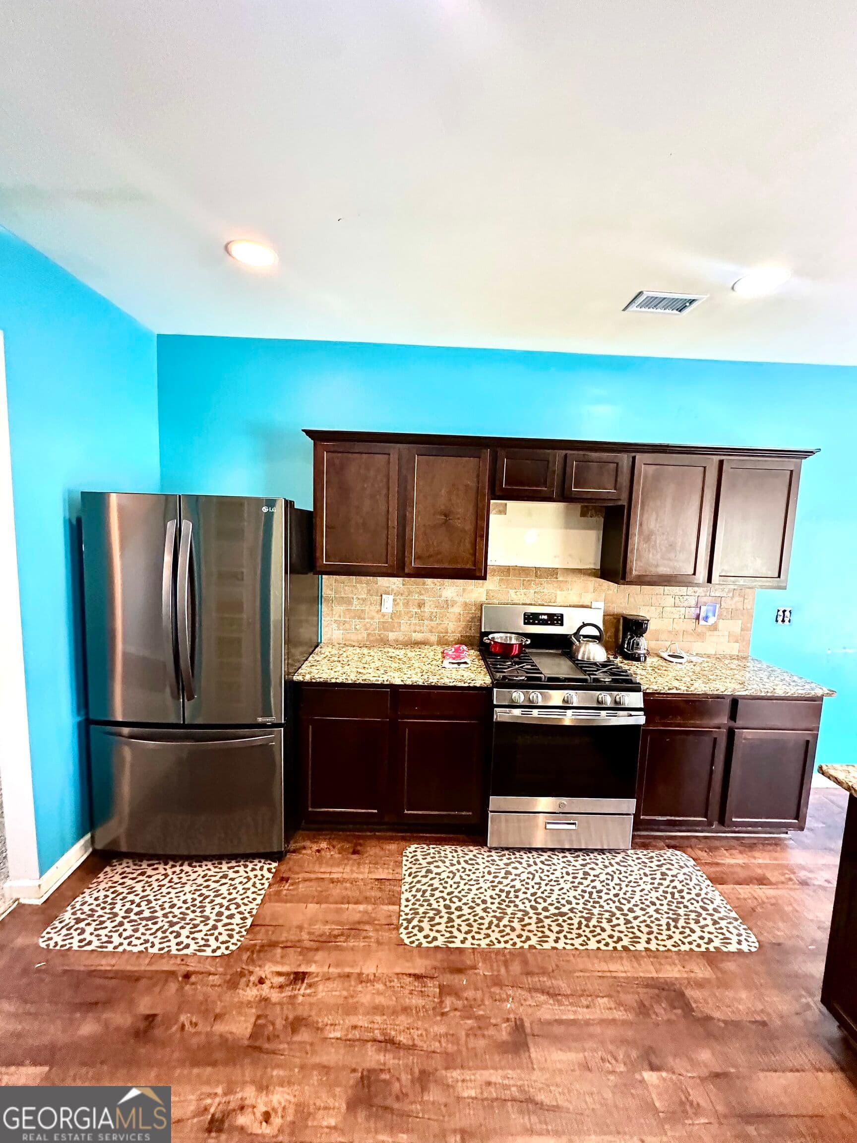 5 bedroom, 3 bathroom, 2,556 sq ft single family residence for sale at 5811 Rex Ridge Parkway, Rex, GA 30273 — photo 4