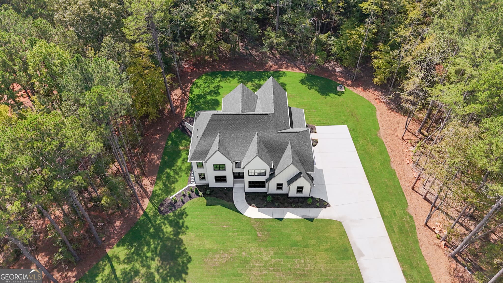 5 bedroom, 5.5 bathroom, 4,732 sq ft single family residence for sale at 614 Morgan Mill Road, Senoia, GA 30276 — photo 3