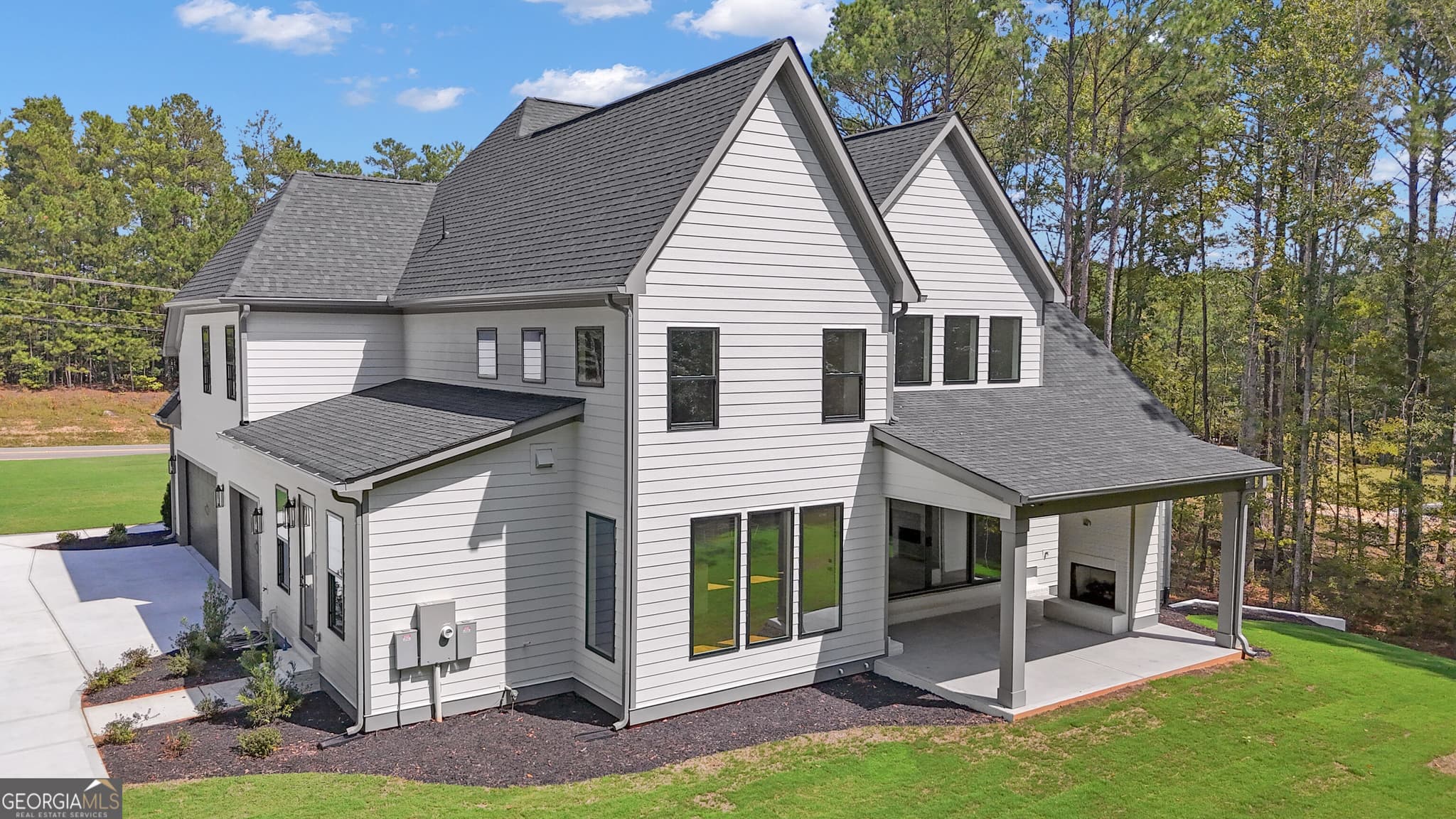 5 bedroom, 5.5 bathroom, 4,732 sq ft single family residence for sale at 614 Morgan Mill Road, Senoia, GA 30276 — photo 4