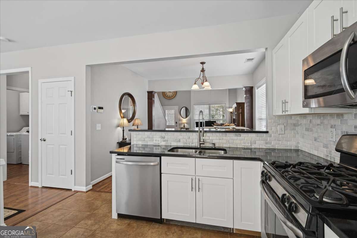 3 bedroom, 2.5 bathroom, 1,435 sq ft single family residence under contract at 1311 Timuquana Trail, Woodstock, GA 30188 — photo 7