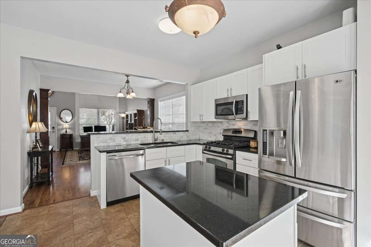 3 bedroom, 2.5 bathroom, 1,435 sq ft single family residence under contract at 1311 Timuquana Trail, Woodstock, GA 30188 — photo 5