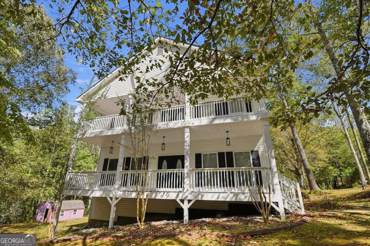 6 bedroom, 4 bathroom single family residence for sale at 5163 W Chapel Hill Road, Douglasville, GA 30135