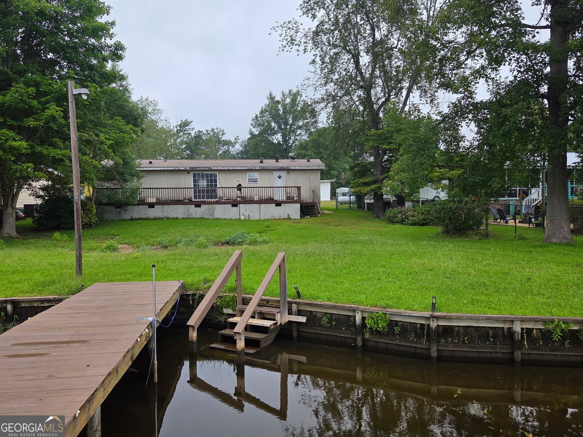 3 bedroom, 2 bathroom, 1,248 sq ft manufactured home,single family residence for sale at 255 J Clubhouse Road, Eatonton, GA 31024 — photo 6
