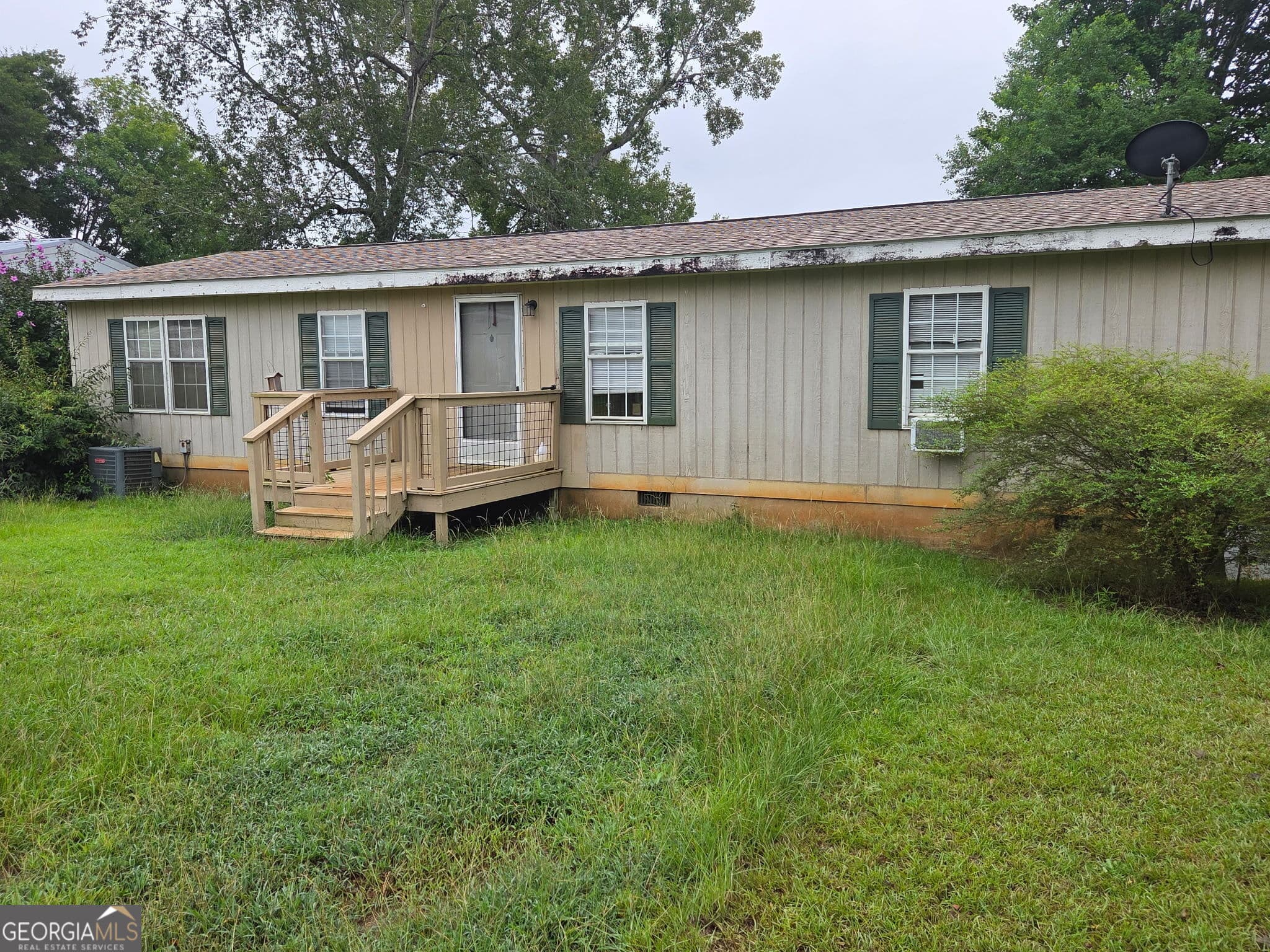 3 bedroom, 2 bathroom, 1,248 sq ft manufactured home,single family residence for sale at 255 J Clubhouse Road, Eatonton, GA 31024 — photo 1 of 6