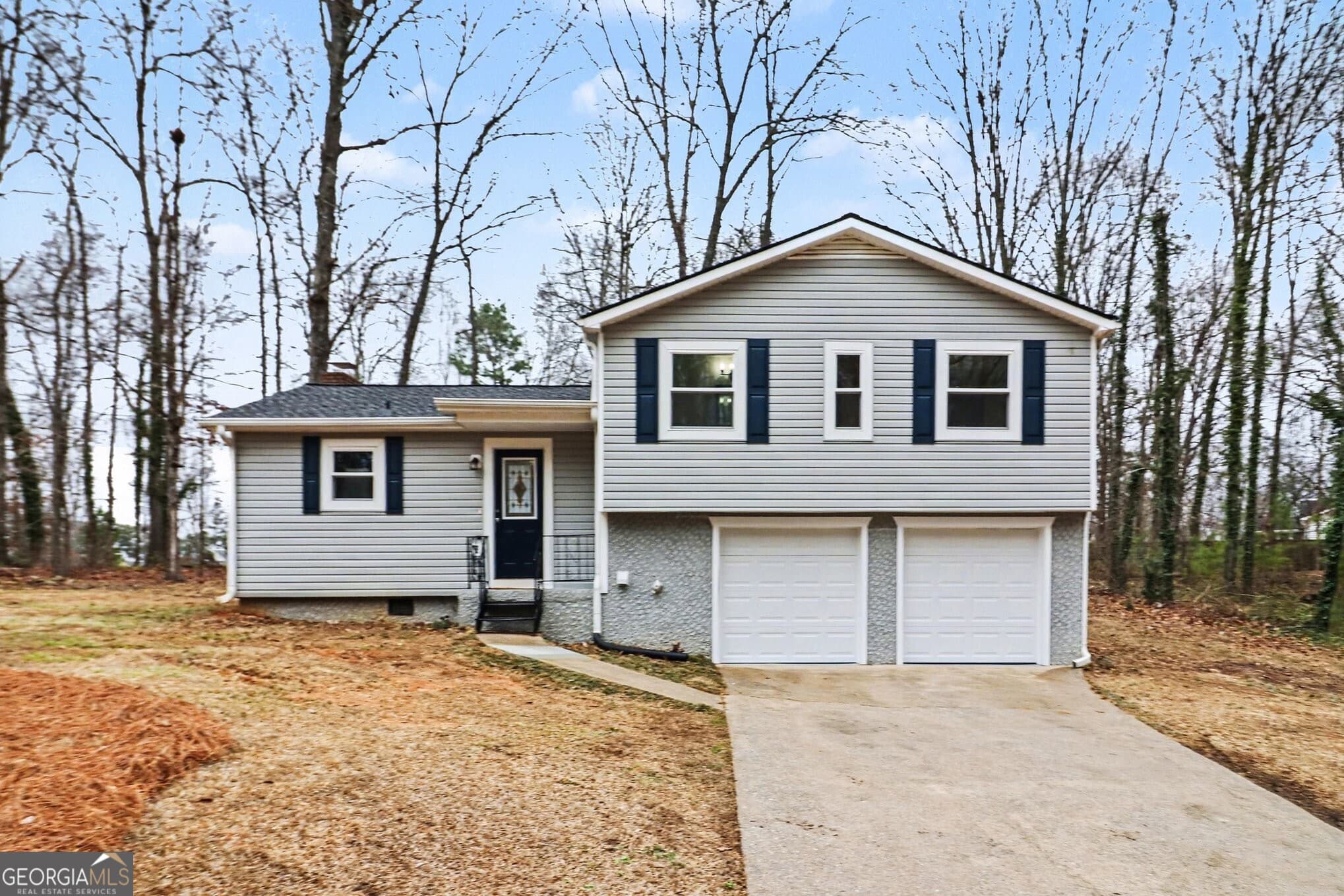 3 bedroom, 2 bathroom, 1,284 sq ft single family residence for sale at 3864 YEAGER Road, Douglasville, GA 30135 — photo 1 of 27