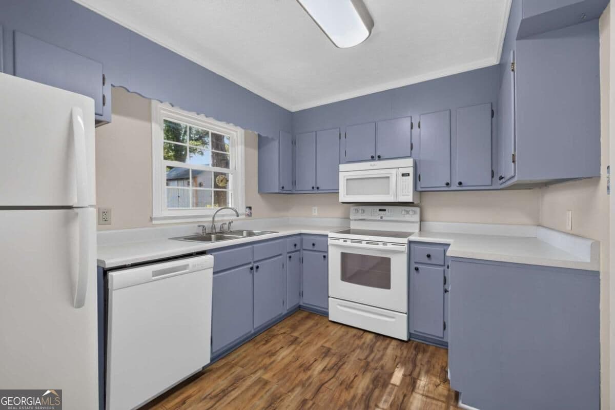 4 bedroom, 2 bathroom, 1,242 sq ft single family residence for sale at 967 Honeysuckle Trail, Winder, GA 30680 — photo 3