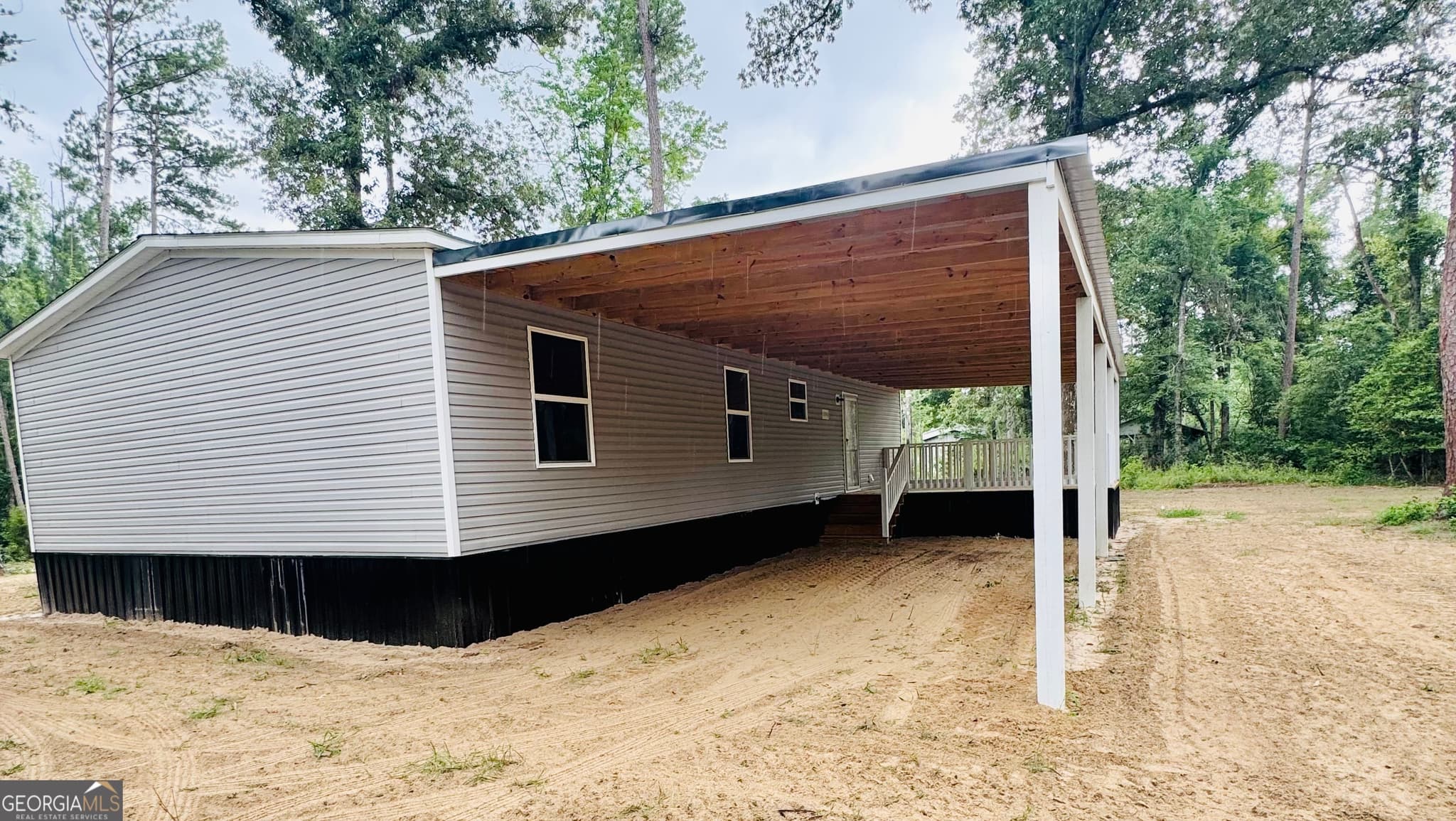3 bedroom, 2 bathroom, 1,456 sq ft manufactured home,single family residence for sale at 231 Miles Road, Uvalda, GA 30473 — photo 5