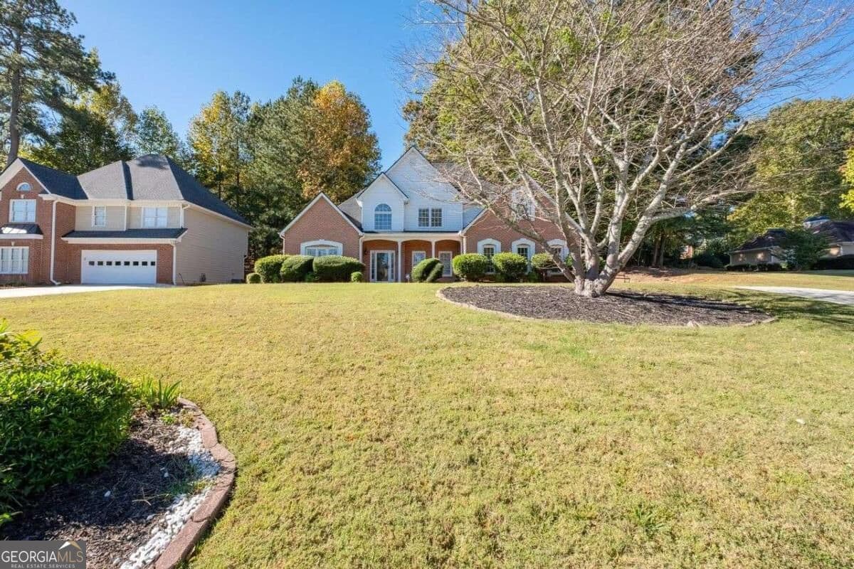 4 bedroom, 3.5 bathroom single family residence for sale at 4810 Highland Lake Drive, Atlanta, GA 30349 — photo 2