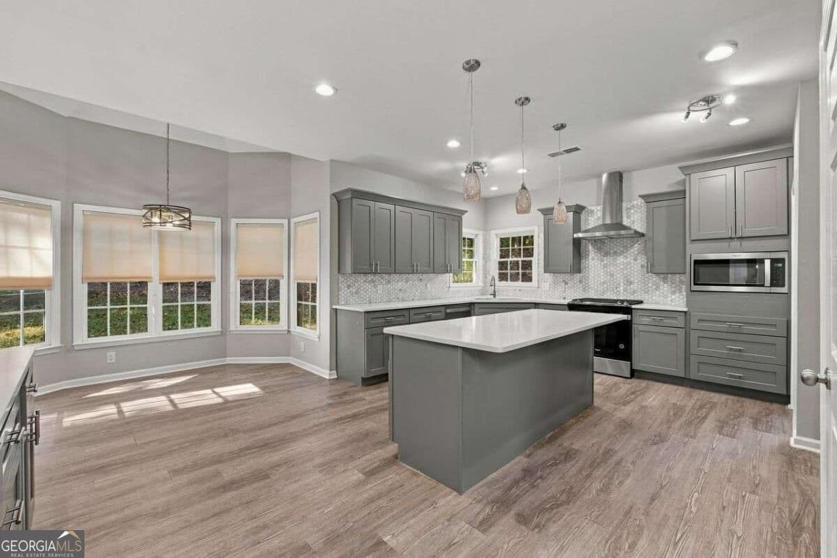 4 bedroom, 3.5 bathroom single family residence for sale at 4810 Highland Lake Drive, Atlanta, GA 30349 — photo 6