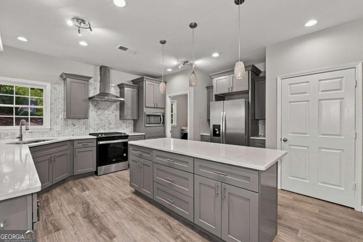 4 bedroom, 3.5 bathroom single family residence for sale at 4810 Highland Lake Drive, Atlanta, GA 30349 — photo 5