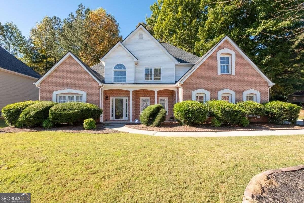 4 bedroom, 3.5 bathroom single family residence for sale at 4810 Highland Lake Drive, Atlanta, GA 30349 — photo 4