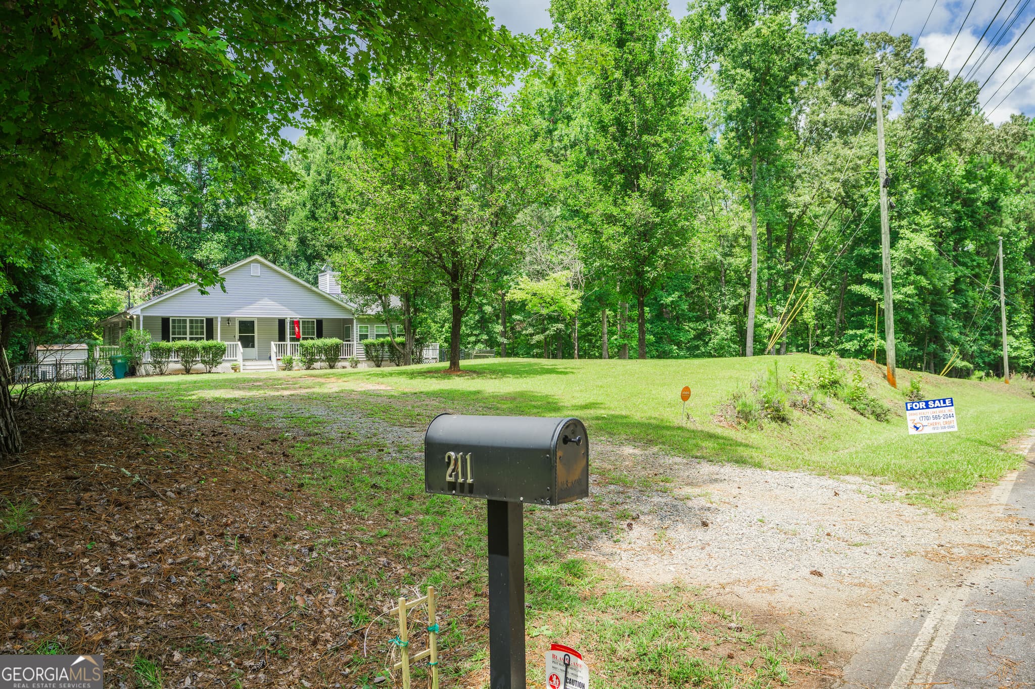 3 bedroom, 2 bathroom, 1,800 sq ft single family residence for sale at 211 Sunfish Trail, Eatonton, GA 31024 — photo 4