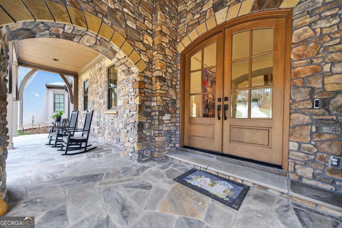 2 bedroom, 4.5 bathroom, 5,329 sq ft single family residence for sale at 1031 Cavalier Cove, Greensboro, GA 30642 — photo 2