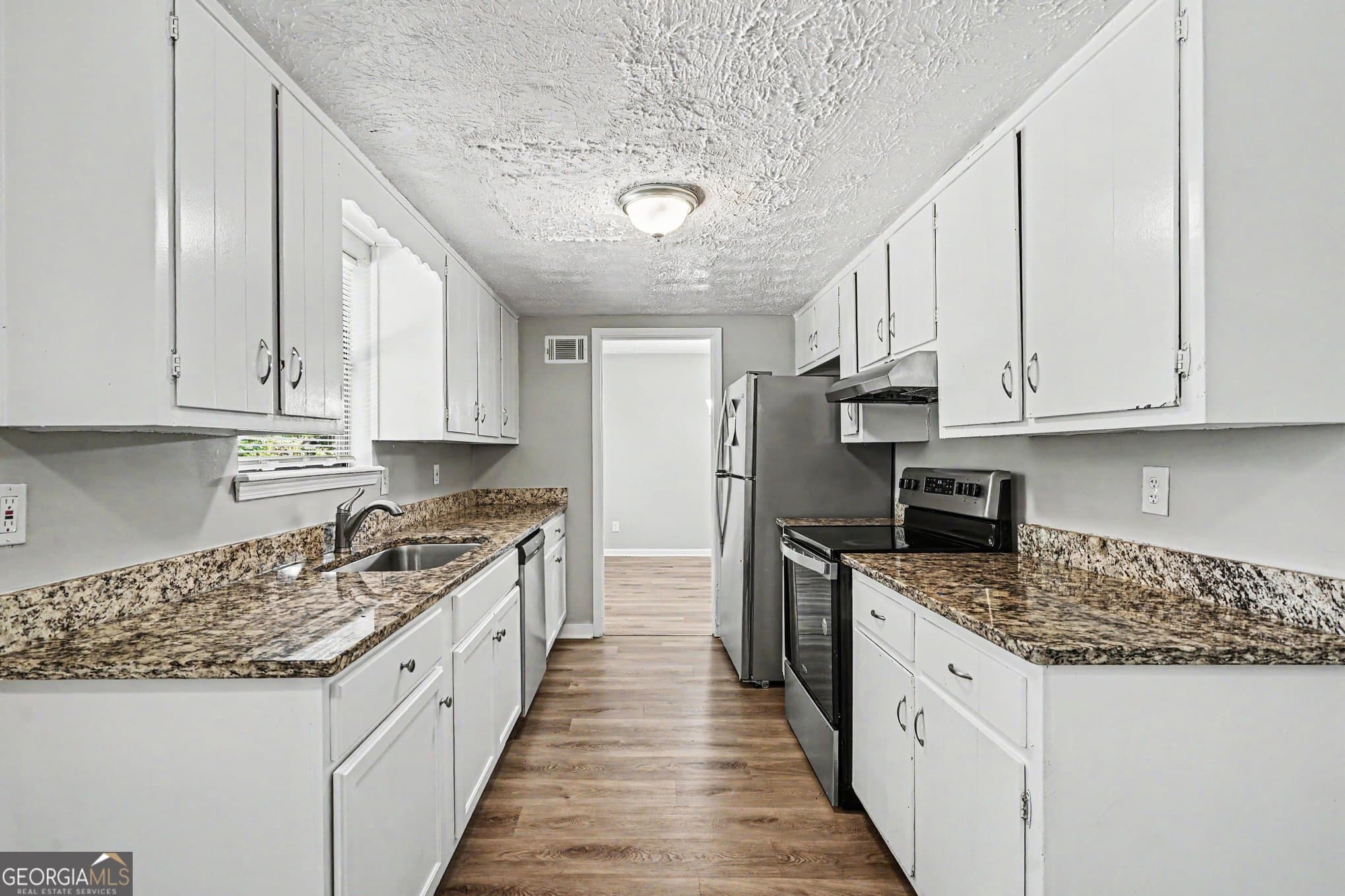4 bedroom, 2.5 bathroom, 2,107 sq ft single family residence for sale at 4406 Blackbirch Lane, Decatur, GA 30034 — photo 5