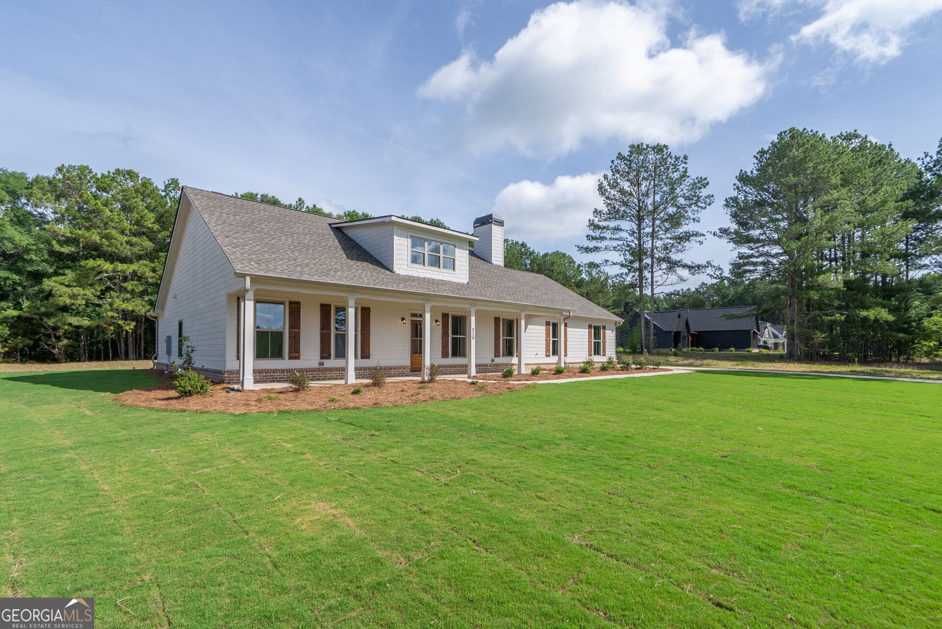 4 bedroom, 2.5 bathroom, 2,162 sq ft single family residence for sale at 218 Woodfin Way, Social Circle, GA 30025 — photo 3