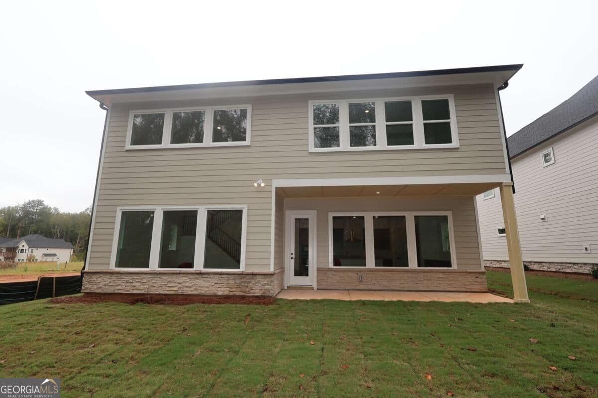 5 bedroom, 4.5 bathroom, 3,144 sq ft single family residence for sale at 4555 Beechnut Circle, Cumming, GA 30028 — photo 2