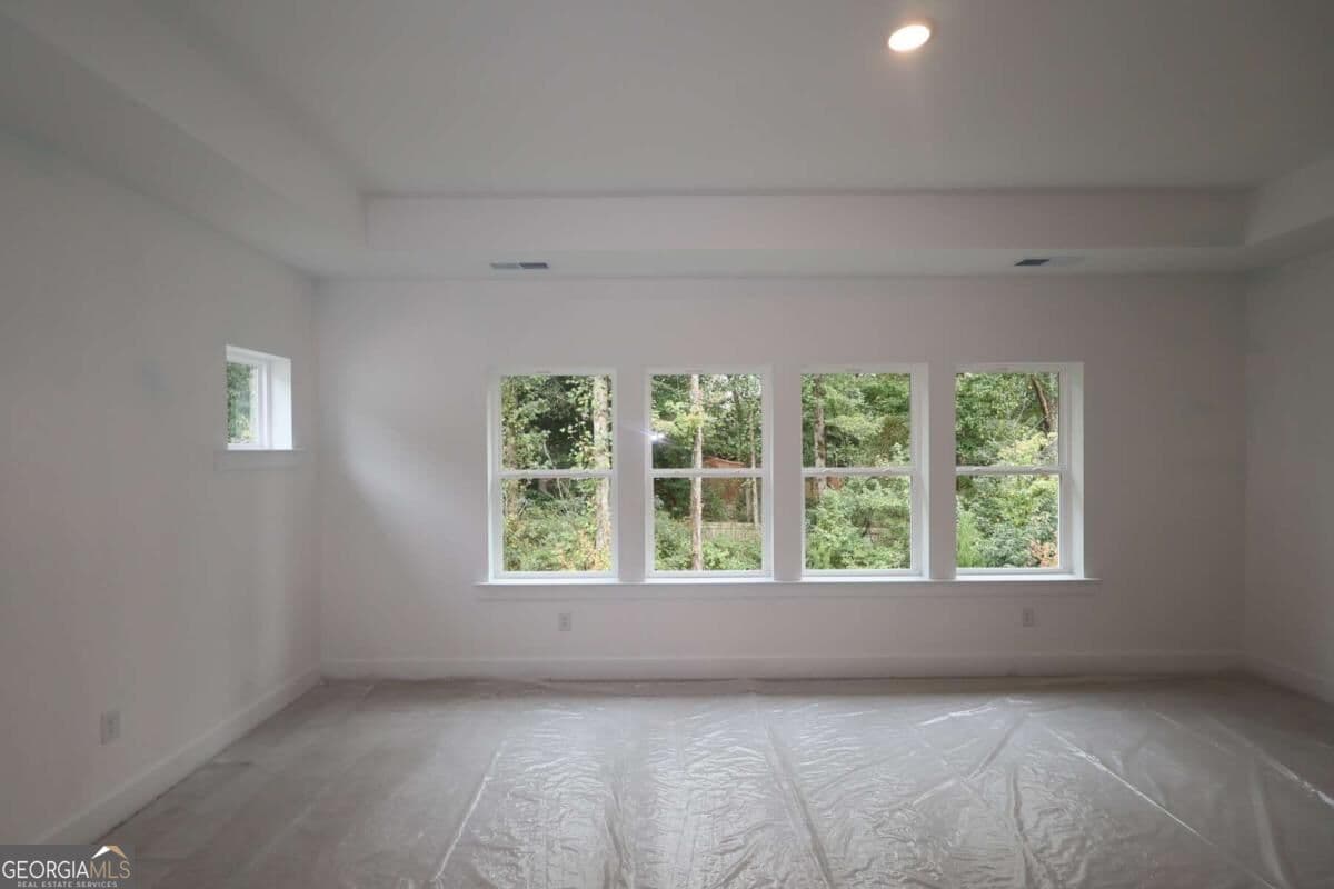 5 bedroom, 4.5 bathroom, 3,144 sq ft single family residence for sale at 4555 Beechnut Circle, Cumming, GA 30028 — photo 6