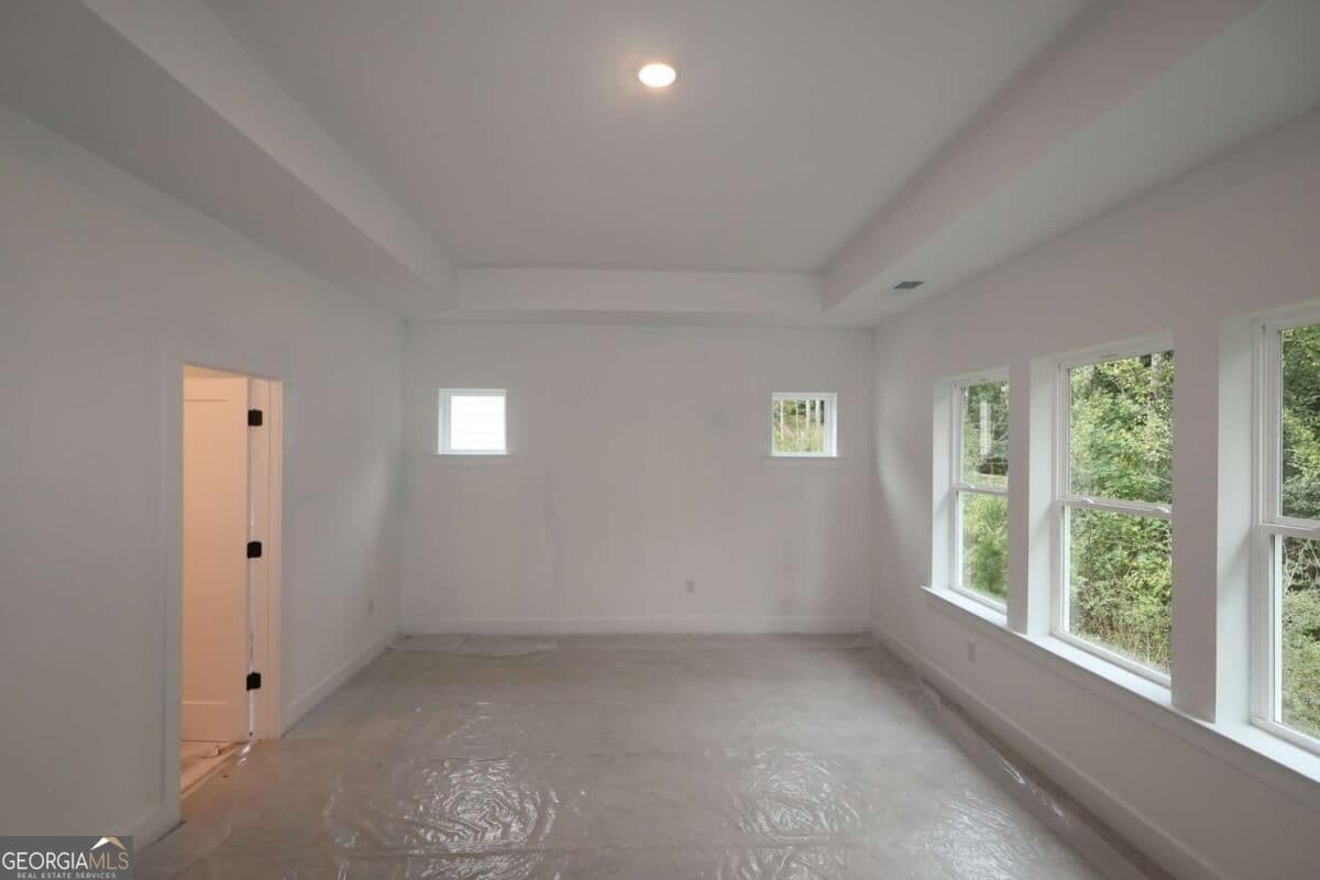 5 bedroom, 4.5 bathroom, 3,144 sq ft single family residence for sale at 4555 Beechnut Circle, Cumming, GA 30028 — photo 7