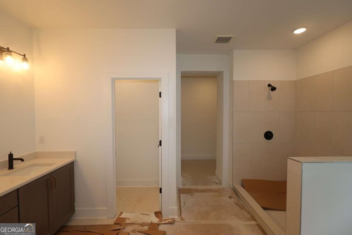 5 bedroom, 4.5 bathroom, 3,144 sq ft single family residence for sale at 4555 Beechnut Circle, Cumming, GA 30028 — photo 5
