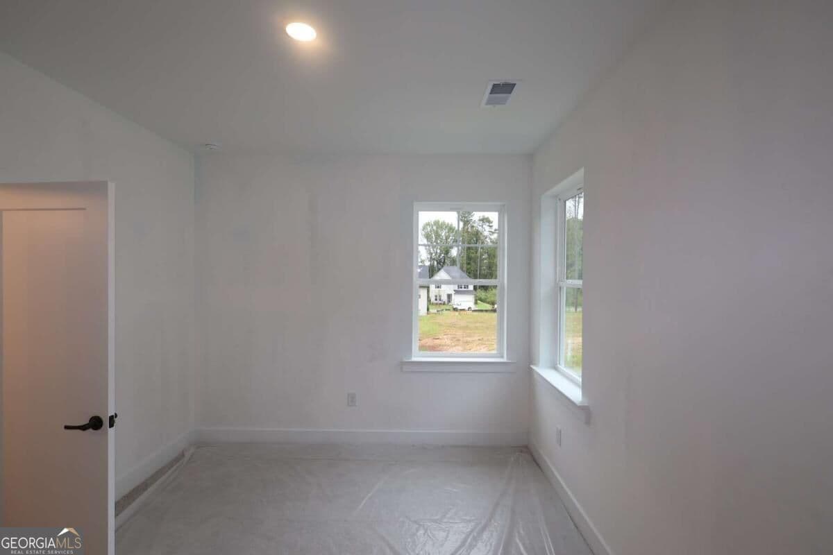 5 bedroom, 4.5 bathroom, 3,144 sq ft single family residence for sale at 4555 Beechnut Circle, Cumming, GA 30028 — photo 8