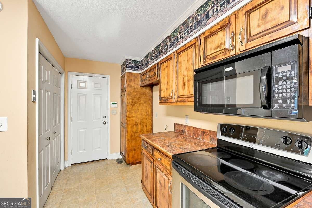 3 bedroom, 2 bathroom, 1,455 sq ft single family residence for sale at 6906 Springwood Drive, Douglasville, GA 30135 — photo 10