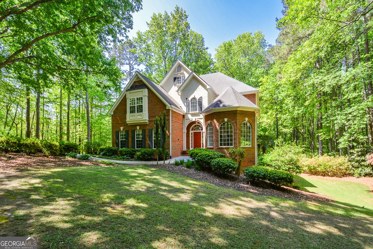 6 bedroom, 5 bathroom, 6,015 sq ft single family residence for sale at 4299 Windham Court, Douglasville, GA 30135 — photo 1 of 59