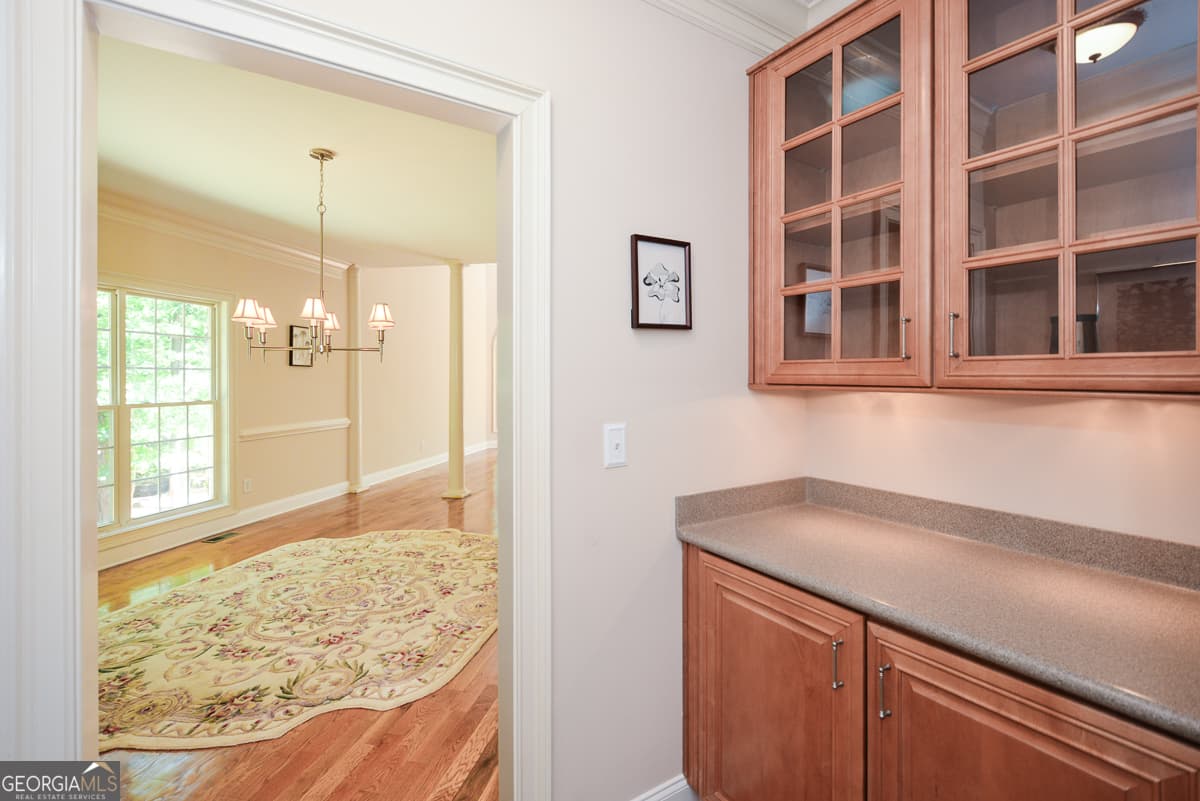 6 bedroom, 5 bathroom, 6,015 sq ft single family residence for sale at 4299 Windham Court, Douglasville, GA 30135 — photo 9