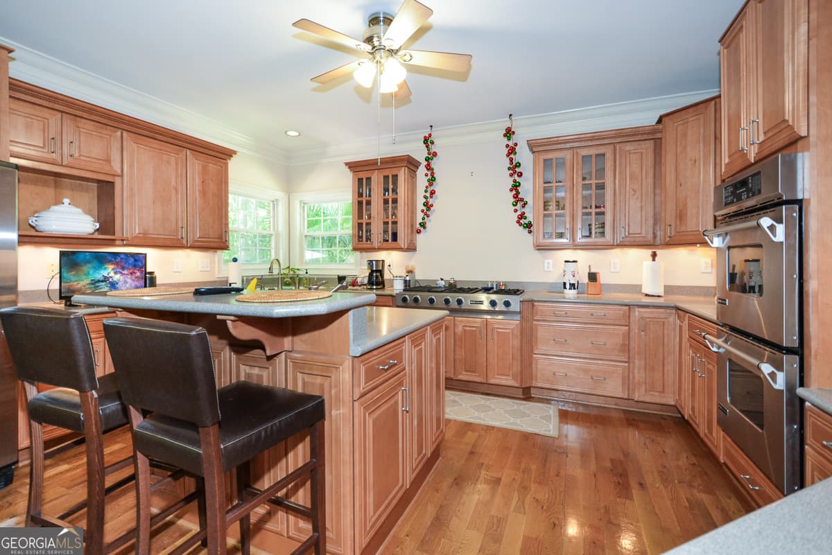 6 bedroom, 5 bathroom, 6,015 sq ft single family residence for sale at 4299 Windham Court, Douglasville, GA 30135 — photo 10