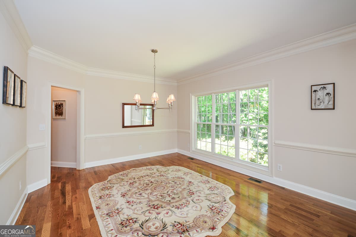 6 bedroom, 5 bathroom, 6,015 sq ft single family residence for sale at 4299 Windham Court, Douglasville, GA 30135 — photo 8