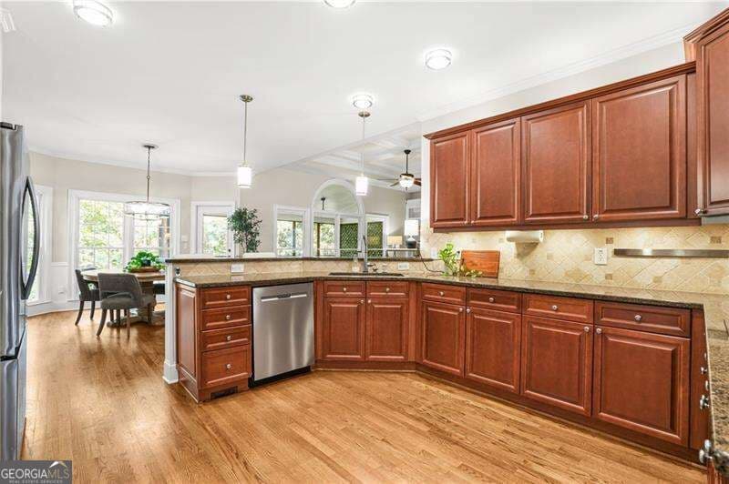 6 bedroom, 5 bathroom, 5,337 sq ft single family residence for sale at 909 Landsdowne Cove, Canton, GA 30115 — photo 7