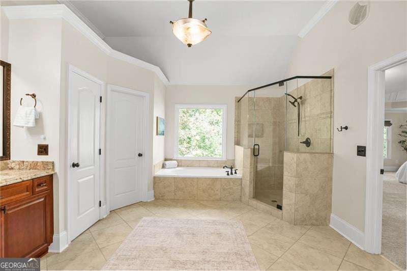 6 bedroom, 5 bathroom, 5,337 sq ft single family residence for sale at 909 Landsdowne Cove, Canton, GA 30115 — photo 9