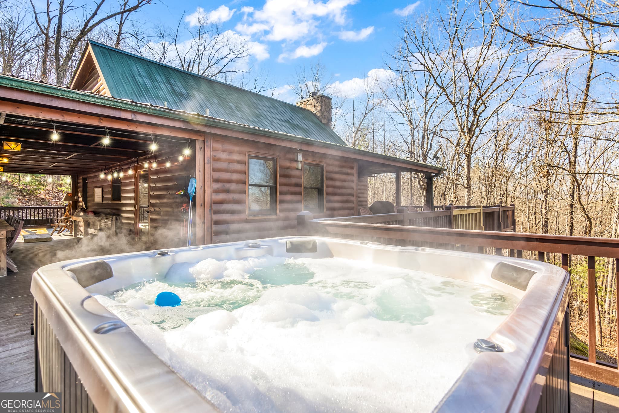 4 bedroom, 3 bathroom, 2,043 sq ft cabin,single family residence for sale at 211 Highland Forest Drive, Morganton, GA 30560 — photo 2