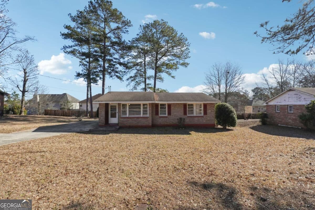 3 bedroom, 1 bathroom, 1,174 sq ft single family residence for sale at 8554 Taylor Road, Riverdale, GA 30274 — photo 2