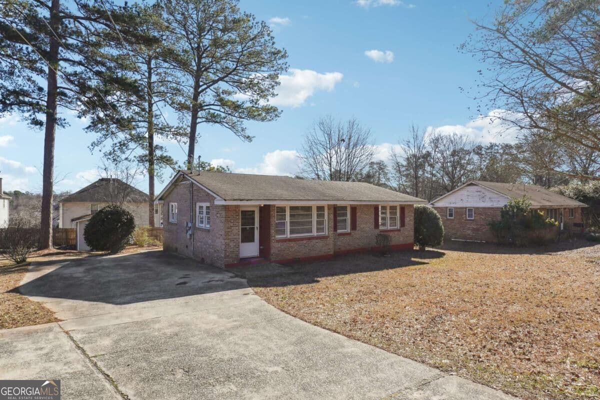3 bedroom, 1 bathroom, 1,174 sq ft single family residence for sale at 8554 Taylor Road, Riverdale, GA 30274 — photo 4