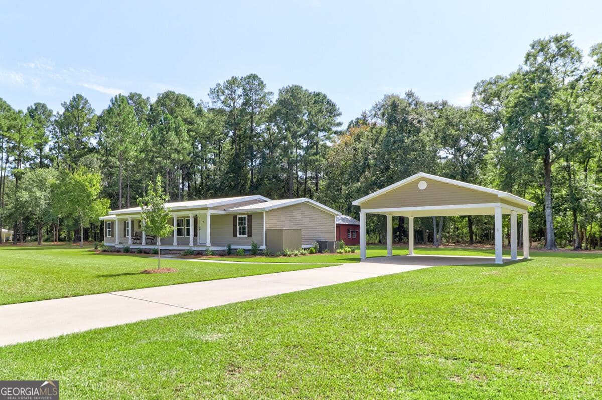 3 bedroom, 2 bathroom, 1,792 sq ft manufactured home,single family residence for sale at 103 Winnai Lane, Guyton, GA 31312 — photo 4