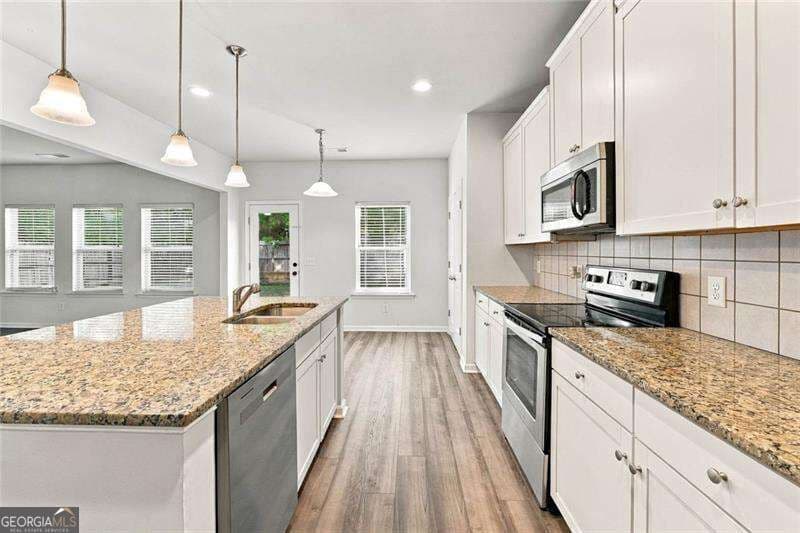 4 bedroom, 3 bathroom, 2,600 sq ft single family residence for sale at 118 Celebration Song, Canton, GA 30114 — photo 2