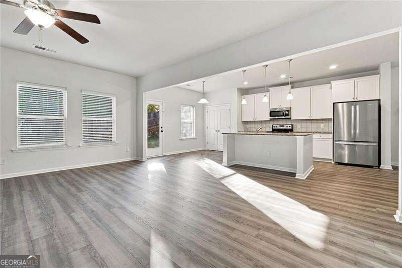 4 bedroom, 3 bathroom, 2,600 sq ft single family residence for sale at 118 Celebration Song, Canton, GA 30114 — photo 4