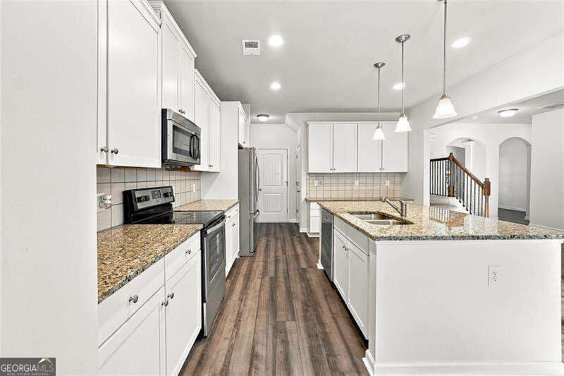 4 bedroom, 3 bathroom, 2,600 sq ft single family residence for sale at 118 Celebration Song, Canton, GA 30114 — photo 8