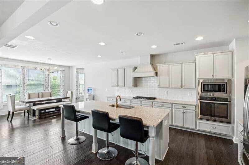 4 bedroom, 3.5 bathroom, 3,268 sq ft single family residence for sale at 2057 White Cypress Court, Smyrna, GA 30082 — photo 8