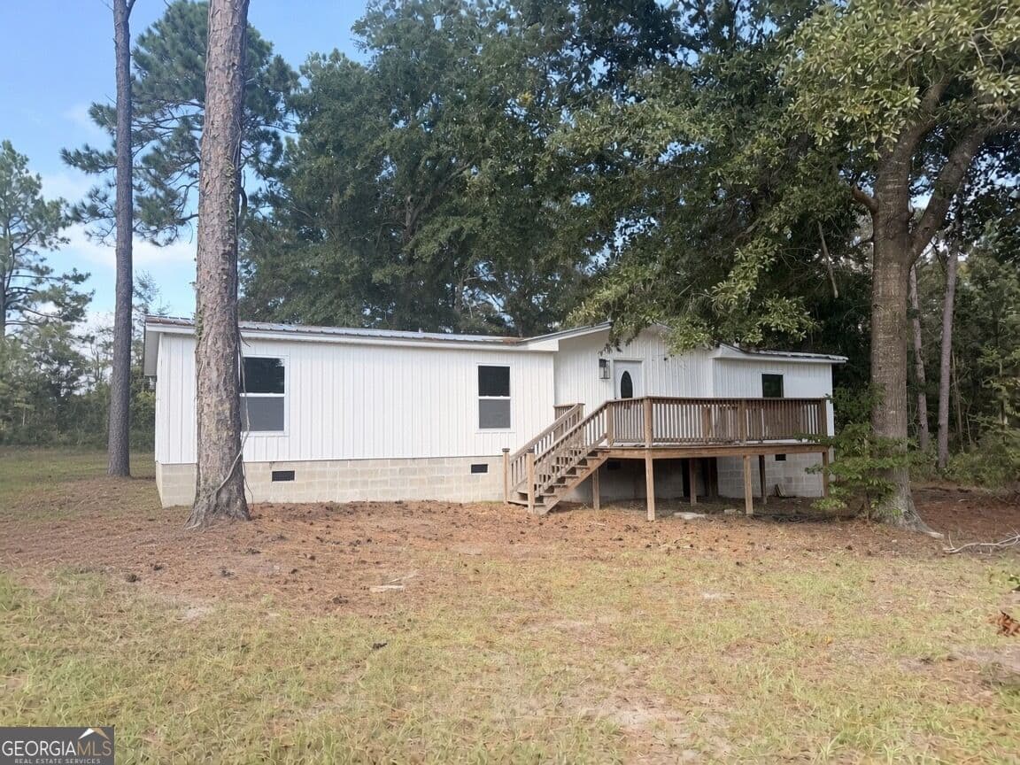 3 bedroom, 2 bathroom, 1,800 sq ft single family residence for sale at 1430 Mark Wood Road, Dexter, GA 31019 — photo 2